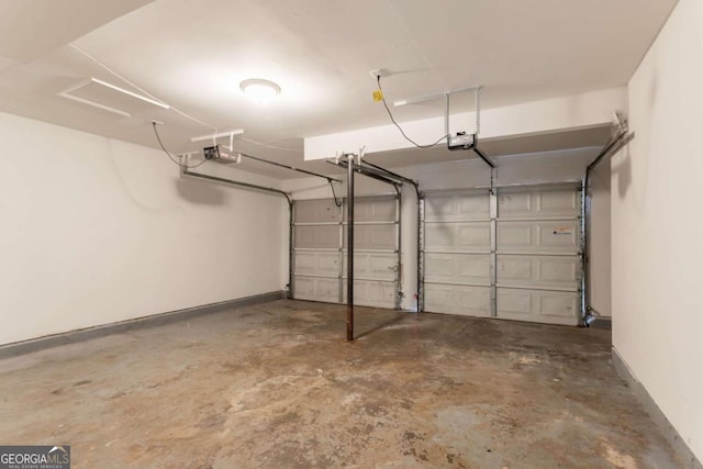 5092 Stone Trce, Stone Mountain, GA 30083 - garage with baseboards and a garage door opener