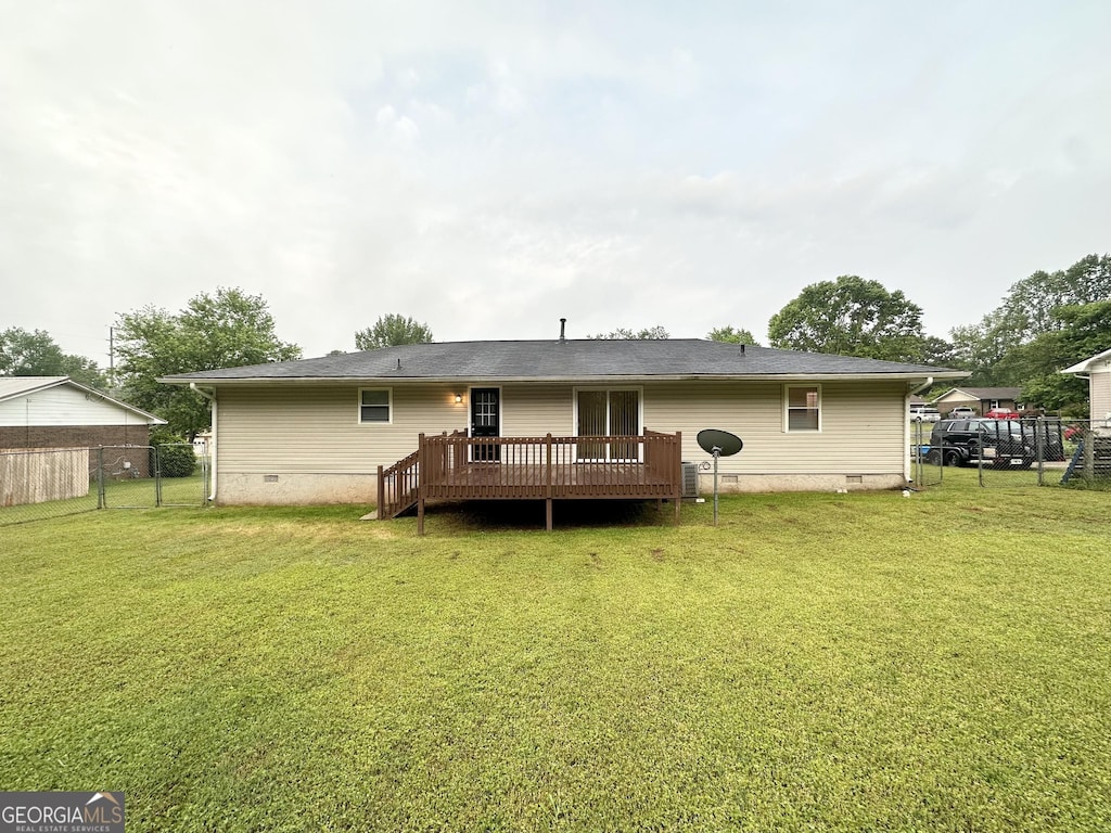 64 Gregory Ct, Dallas, GA 30157 - rear view of house featuring crawl space and a wooden deck