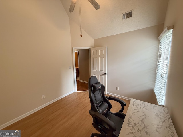 3269 N Winds Trl, Douglasville, GA 30135 - office area featuring wood finished floors, baseboards, ceiling fan, and high vaulted ceiling