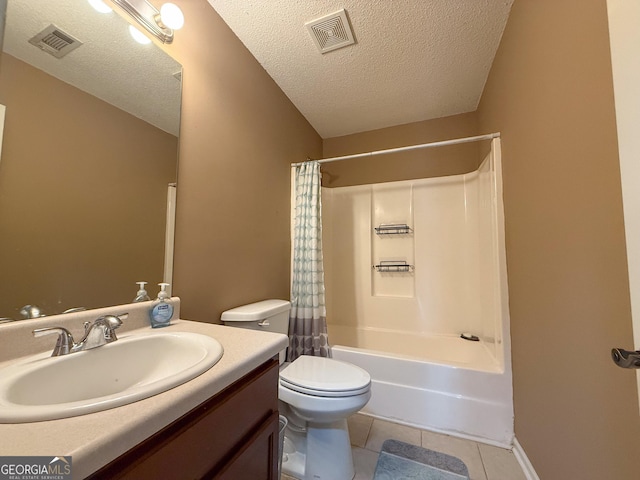 3269 N Winds Trl, Douglasville, GA 30135 - full bathroom featuring vanity, tile patterned floors, toilet, a textured ceiling, and shower / bath combo with shower curtain