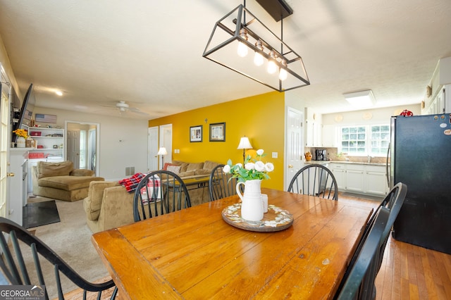 1885 N Creek Cir, Alpharetta, GA 30009 - dining area with ceiling fan and light wood-style flooring