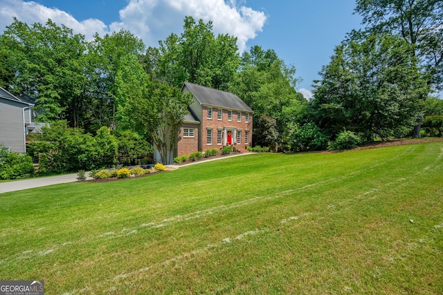1885 N Creek Cir, Alpharetta, GA 30009 - view of front facade with brick siding and a front lawn
