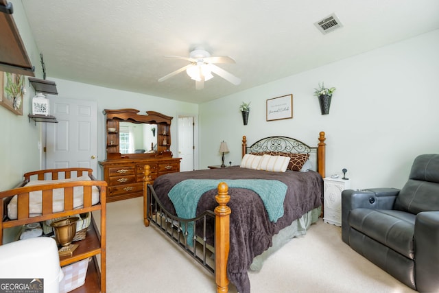 1885 N Creek Cir, Alpharetta, GA 30009 - bedroom featuring light colored carpet and ceiling fan