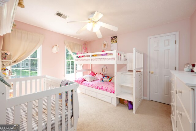 1885 N Creek Cir, Alpharetta, GA 30009 - bedroom featuring light carpet and ceiling fan