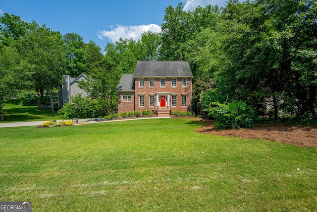 1885 N Creek Cir, Alpharetta, GA 30009 - colonial-style house with brick siding and a front lawn