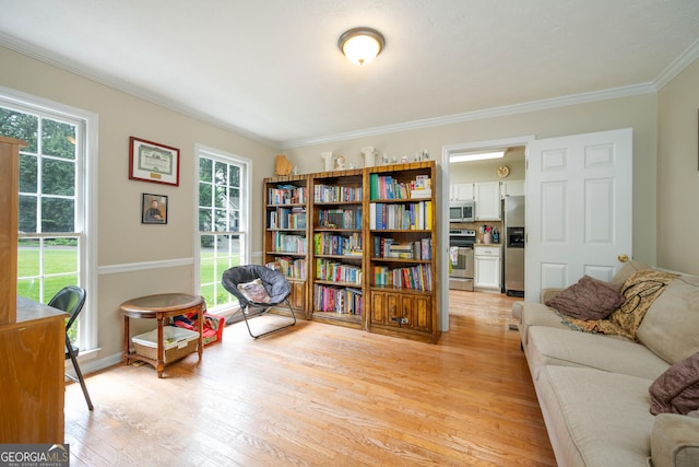 1885 N Creek Cir, Alpharetta, GA 30009 - sitting room featuring ornamental molding, light wood-type flooring, and baseboards