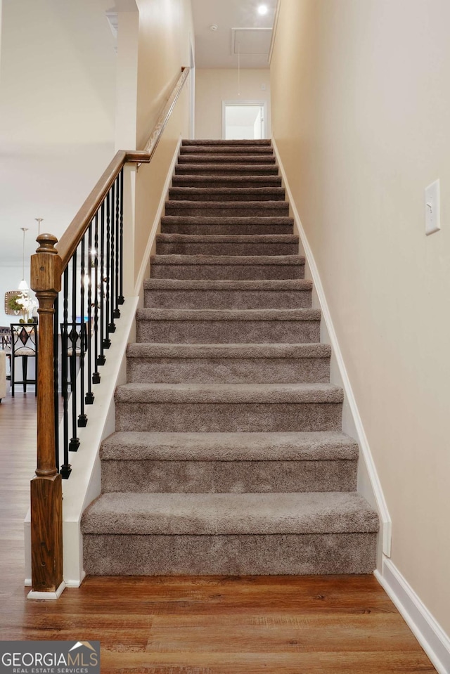 1279 Day Dr, Bogart, GA 30622 - stairway with wood finished floors, attic access, and baseboards