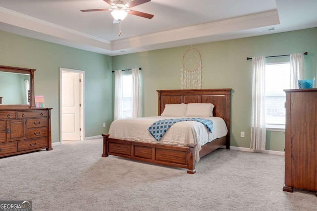1279 Day Dr, Bogart, GA 30622 - bedroom with ornamental molding, carpet floors, a tray ceiling, baseboards, and a ceiling fan