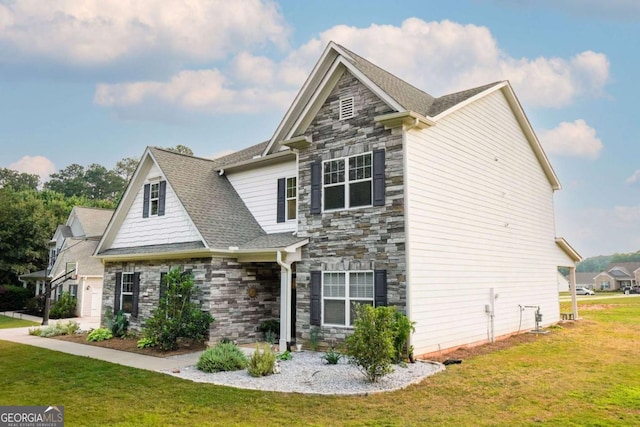 1279 Day Dr, Bogart, GA 30622 - view of front of property with stone siding, a front lawn, and a shingled roof