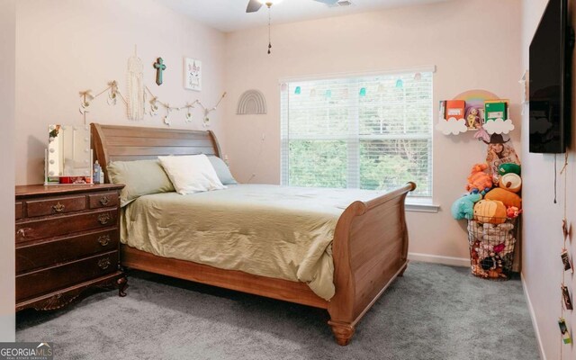1279 Day Dr, Bogart, GA 30622 - carpeted bedroom featuring multiple windows, a ceiling fan, and baseboards