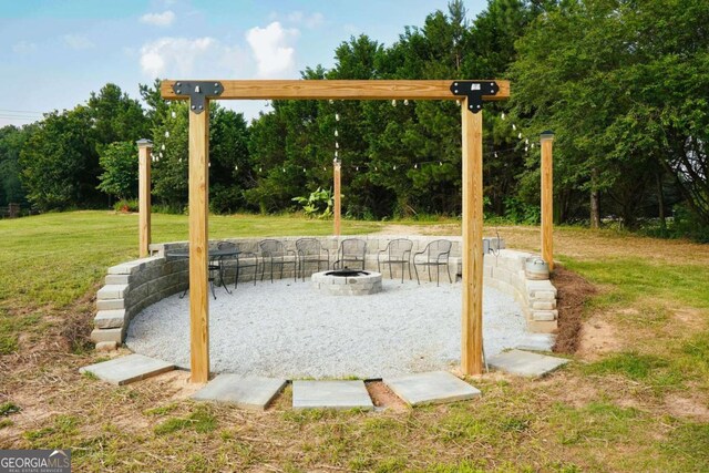 1279 Day Dr, Bogart, GA 30622 - view of patio with a fire pit