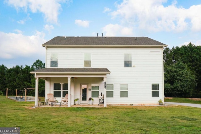 1279 Day Dr, Bogart, GA 30622 - rear view of house featuring a patio and a lawn