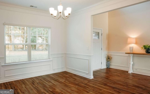 1279 Day Dr, Bogart, GA 30622 - unfurnished room with a chandelier, wood finished floors, ornamental molding, and wainscoting