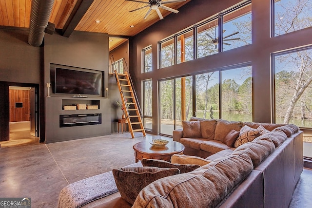168 State Line Rd, Cloudland, GA 30731 - living area with a wood ceiling with exposed beams, a high ceiling, a ceiling fan, and concrete floors