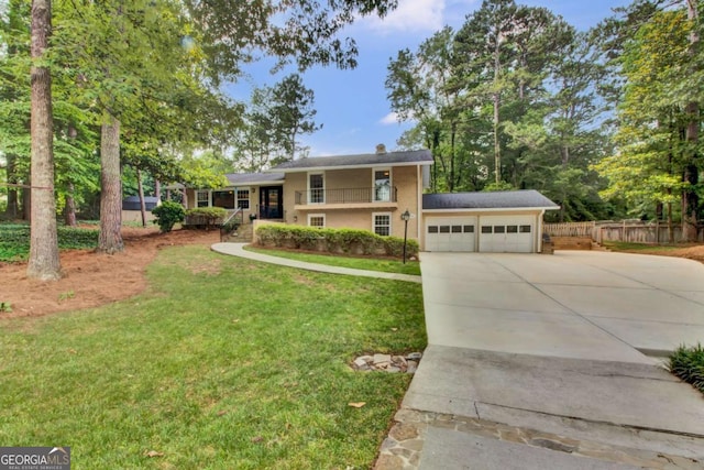 4794 Glenbonnie Ct, Dunwoody, GA 30360 - split level home featuring concrete driveway and an attached garage