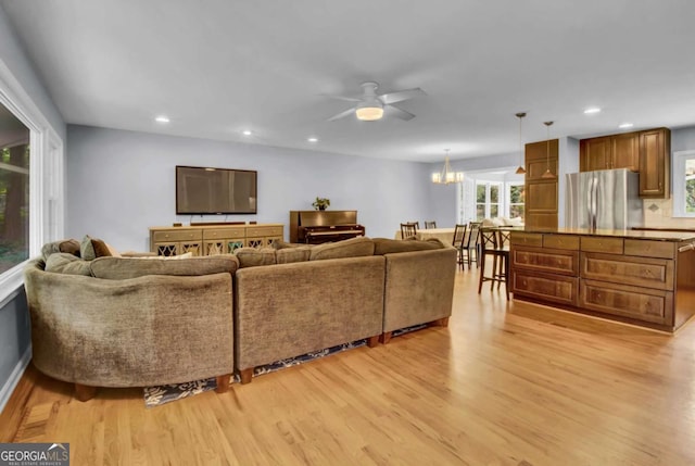4794 Glenbonnie Ct, Dunwoody, GA 30360 - living area with light wood-type flooring, ceiling fan, recessed lighting, and a chandelier