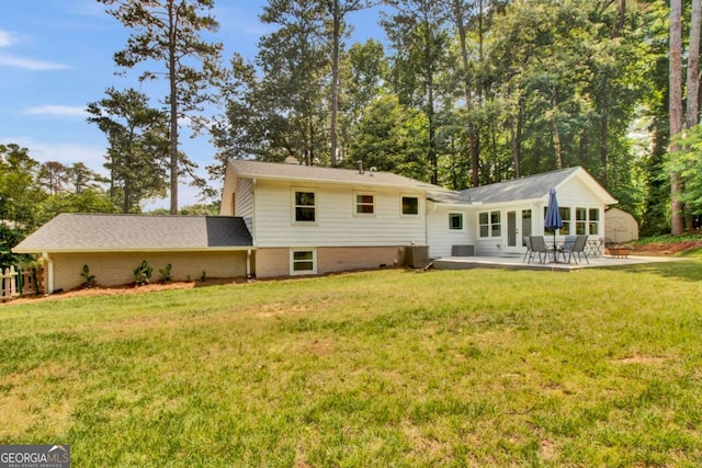 4794 Glenbonnie Ct, Dunwoody, GA 30360 - back of house featuring a patio, a lawn, and central AC