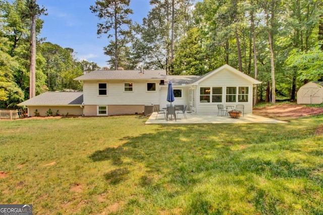 4794 Glenbonnie Ct, Dunwoody, GA 30360 - rear view of property featuring a patio, a lawn, and view of scattered trees