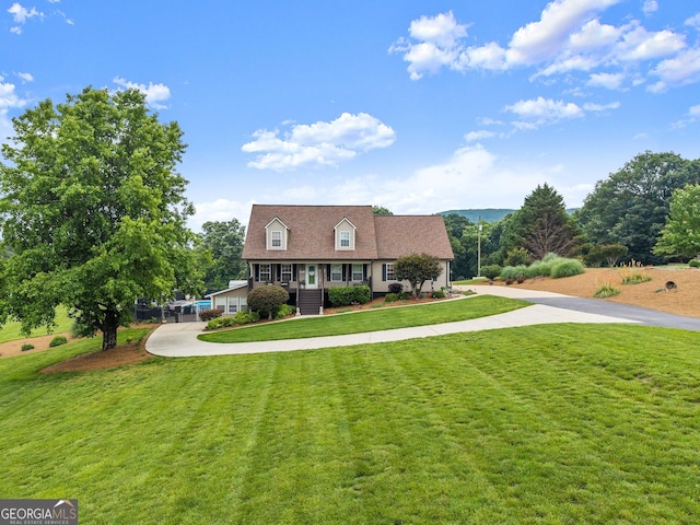 8958 Bill Savage Rd, Lula, GA 30554 - cape cod house with curved driveway and a front yard