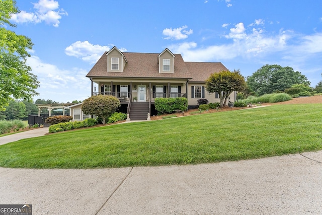 8958 Bill Savage Rd, Lula, GA 30554 - new england style home featuring stairs, a front yard, covered porch, and a shingled roof