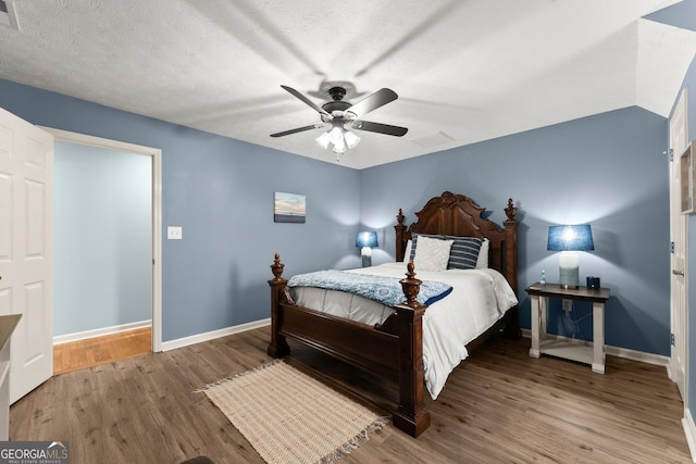 8958 Bill Savage Rd, Lula, GA 30554 - bedroom featuring wood finished floors, baseboards, and ceiling fan