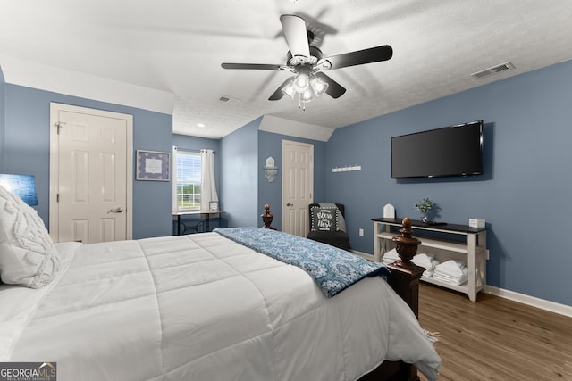 8958 Bill Savage Rd, Lula, GA 30554 - bedroom featuring wood finished floors, baseboards, and ceiling fan