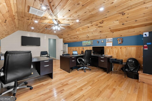 8958 Bill Savage Rd, Lula, GA 30554 - office area featuring wood walls, vaulted ceiling, light wood finished floors, wainscoting, and ceiling fan
