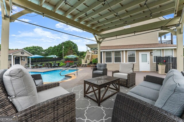 8958 Bill Savage Rd, Lula, GA 30554 - view of patio with an outdoor living space, stairway, and an outbuilding