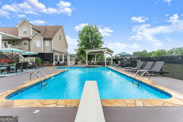8958 Bill Savage Rd, Lula, GA 30554 - view of swimming pool featuring a patio, a pergola, and a diving board