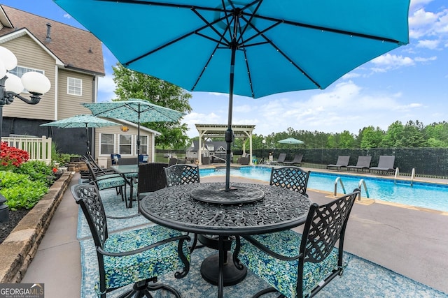 8958 Bill Savage Rd, Lula, GA 30554 - view of swimming pool featuring outdoor dining space, a patio area, and a pergola