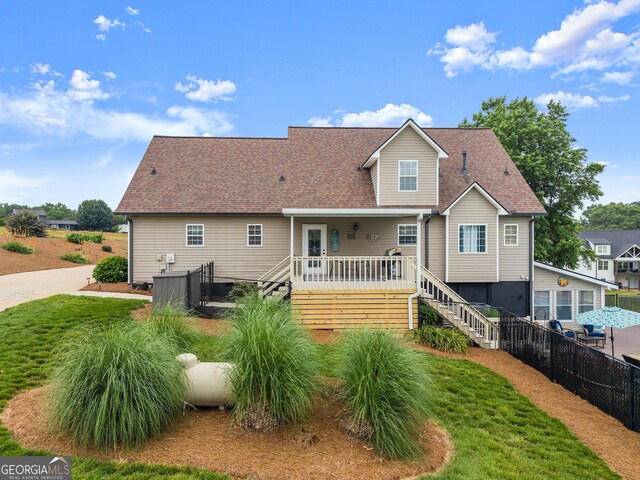 8958 Bill Savage Rd, Lula, GA 30554 - back of house featuring a wooden deck, stairway, and a shingled roof