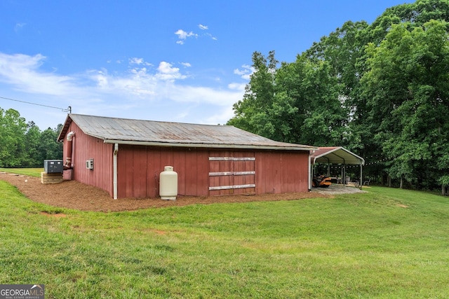 8958 Bill Savage Rd, Lula, GA 30554 - view of pole building with a yard and a carport