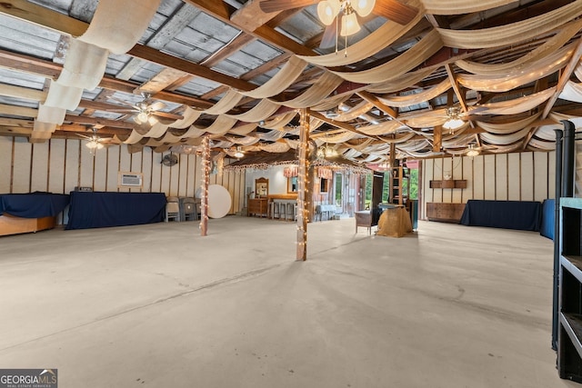 8958 Bill Savage Rd, Lula, GA 30554 - miscellaneous room featuring a ceiling fan and concrete flooring