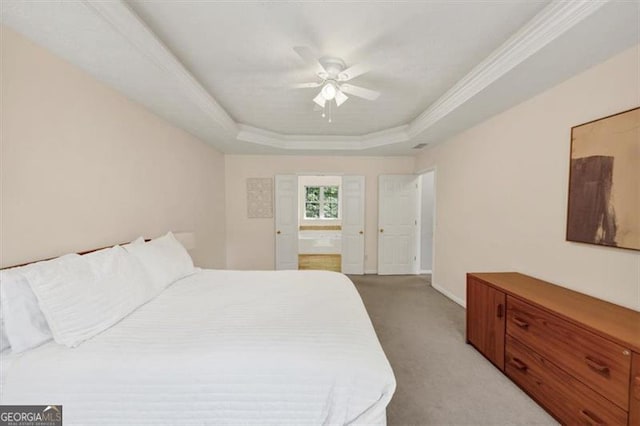 1625 Clark Lake Dr NW, Acworth, GA 30102 - bedroom featuring light carpet, a tray ceiling, crown molding, ensuite bathroom, and a ceiling fan