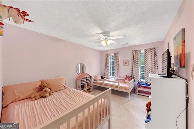 1625 Clark Lake Dr NW, Acworth, GA 30102 - bedroom with light carpet, a textured ceiling, and a ceiling fan