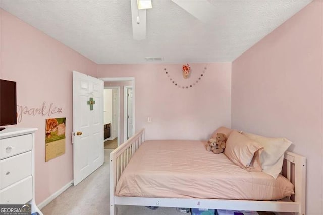 1625 Clark Lake Dr NW, Acworth, GA 30102 - bedroom with light colored carpet, a textured ceiling, a ceiling fan, and baseboards