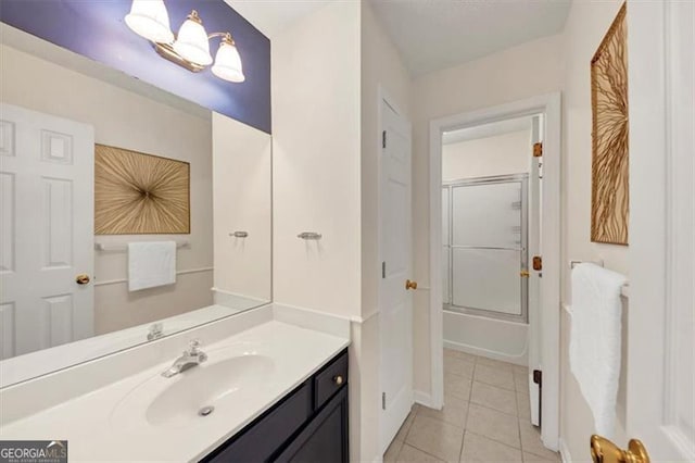 1625 Clark Lake Dr NW, Acworth, GA 30102 - bathroom with tile patterned floors, vanity, combined bath / shower with glass door, and baseboards