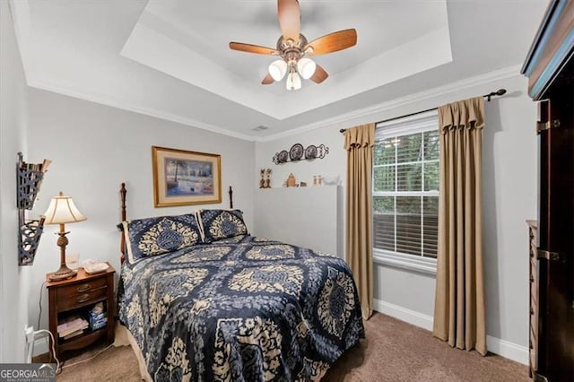 1625 Clark Lake Dr NW, Acworth, GA 30102 - bedroom featuring carpet flooring, a raised ceiling, baseboards, ceiling fan, and ornamental molding