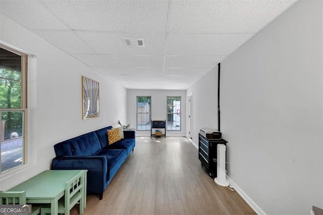 1625 Clark Lake Dr NW, Acworth, GA 30102 - living room with a paneled ceiling, wood finished floors, and baseboards