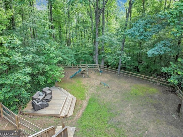 1625 Clark Lake Dr NW, Acworth, GA 30102 - fenced backyard with a playground