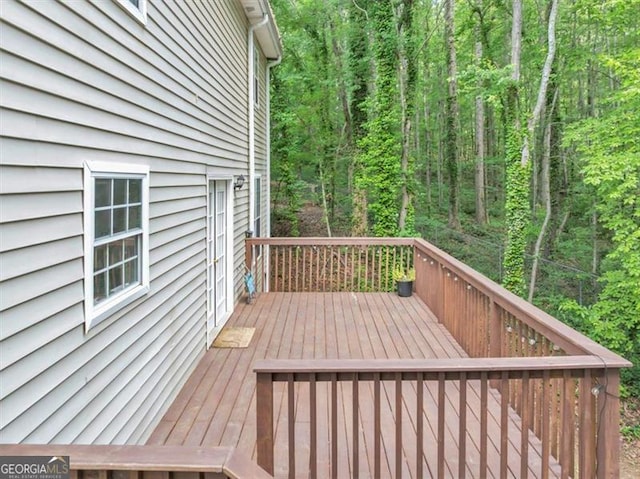 1625 Clark Lake Dr NW, Acworth, GA 30102 - wooden deck with a forest view