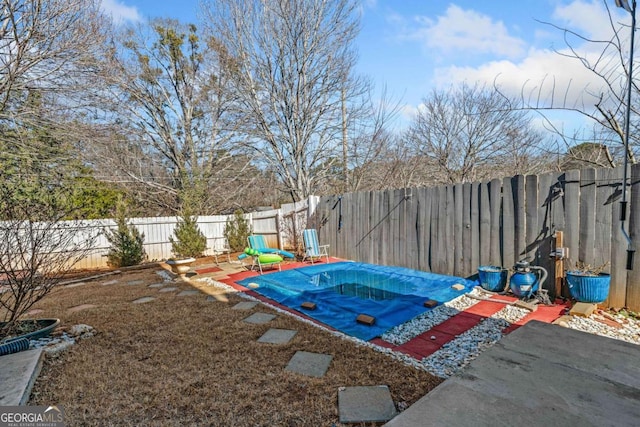 2885 Field Spring Dr, Lithonia, GA 30058 - view of swimming pool with a fenced backyard and a patio