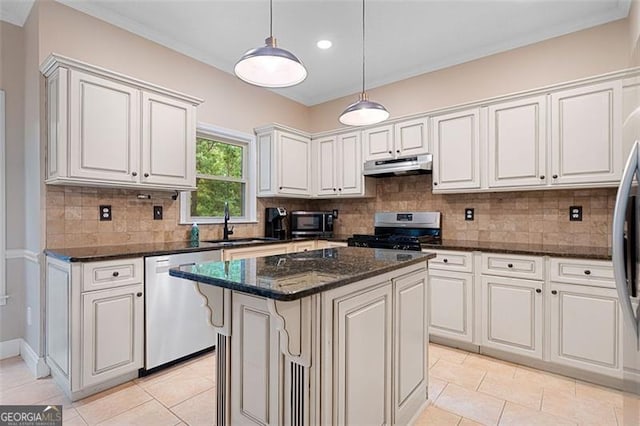 404 Pine Grove Way, Woodstock, GA 30189 - kitchen with stainless steel dishwasher, under cabinet range hood, range with gas cooktop, white cabinets, and a sink