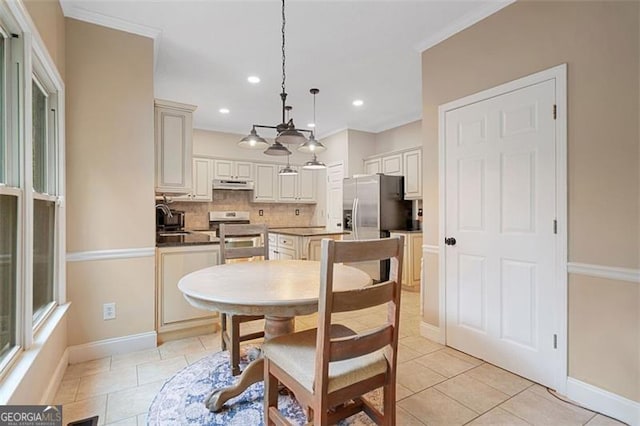 404 Pine Grove Way, Woodstock, GA 30189 - dining space featuring light tile patterned floors, baseboards, recessed lighting, and crown molding