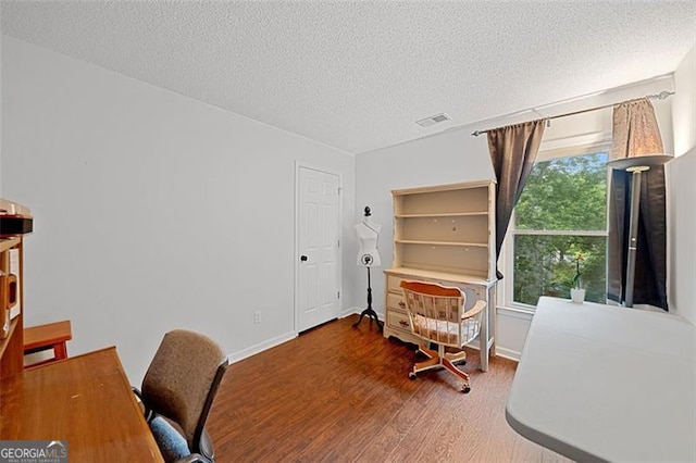 404 Pine Grove Way, Woodstock, GA 30189 - office with wood finished floors, a textured ceiling, and baseboards