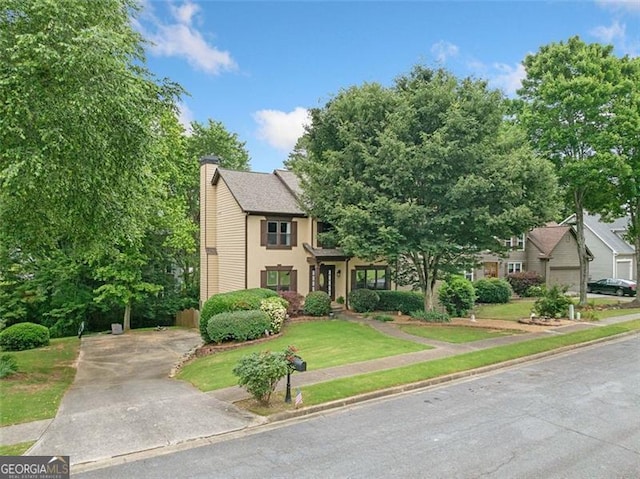 404 Pine Grove Way, Woodstock, GA 30189 - view of front of house with a chimney, a front lawn, and stucco siding