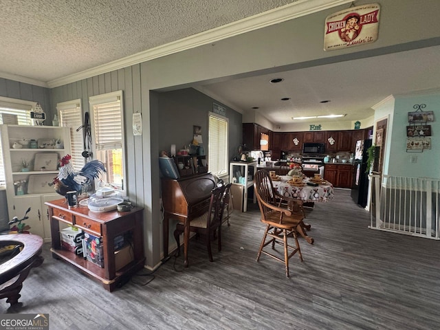 114 Van Dr, Kathleen, GA 31047 - dining space featuring ornamental molding, dark wood-style floors, and a textured ceiling