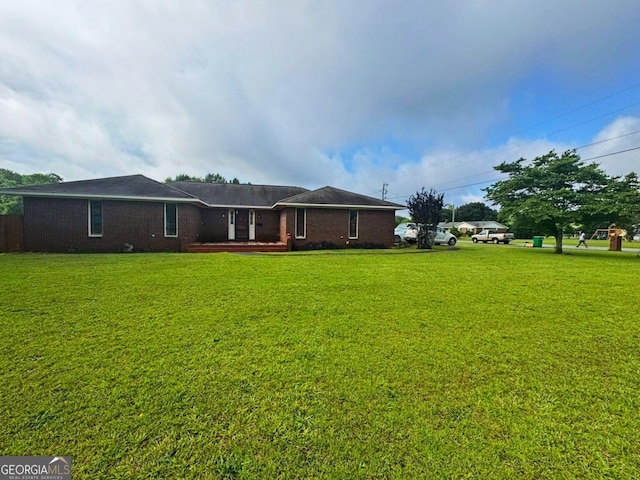 114 Van Dr, Kathleen, GA 31047 - back of property featuring a yard and brick siding