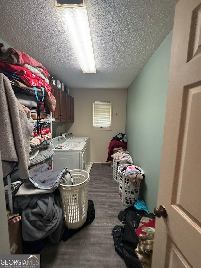 114 Van Dr, Kathleen, GA 31047 - washroom with independent washer and dryer, a textured ceiling, dark wood finished floors, and cabinet space