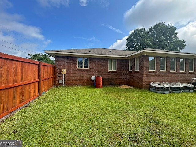 114 Van Dr, Kathleen, GA 31047 - back of house featuring brick siding and crawl space